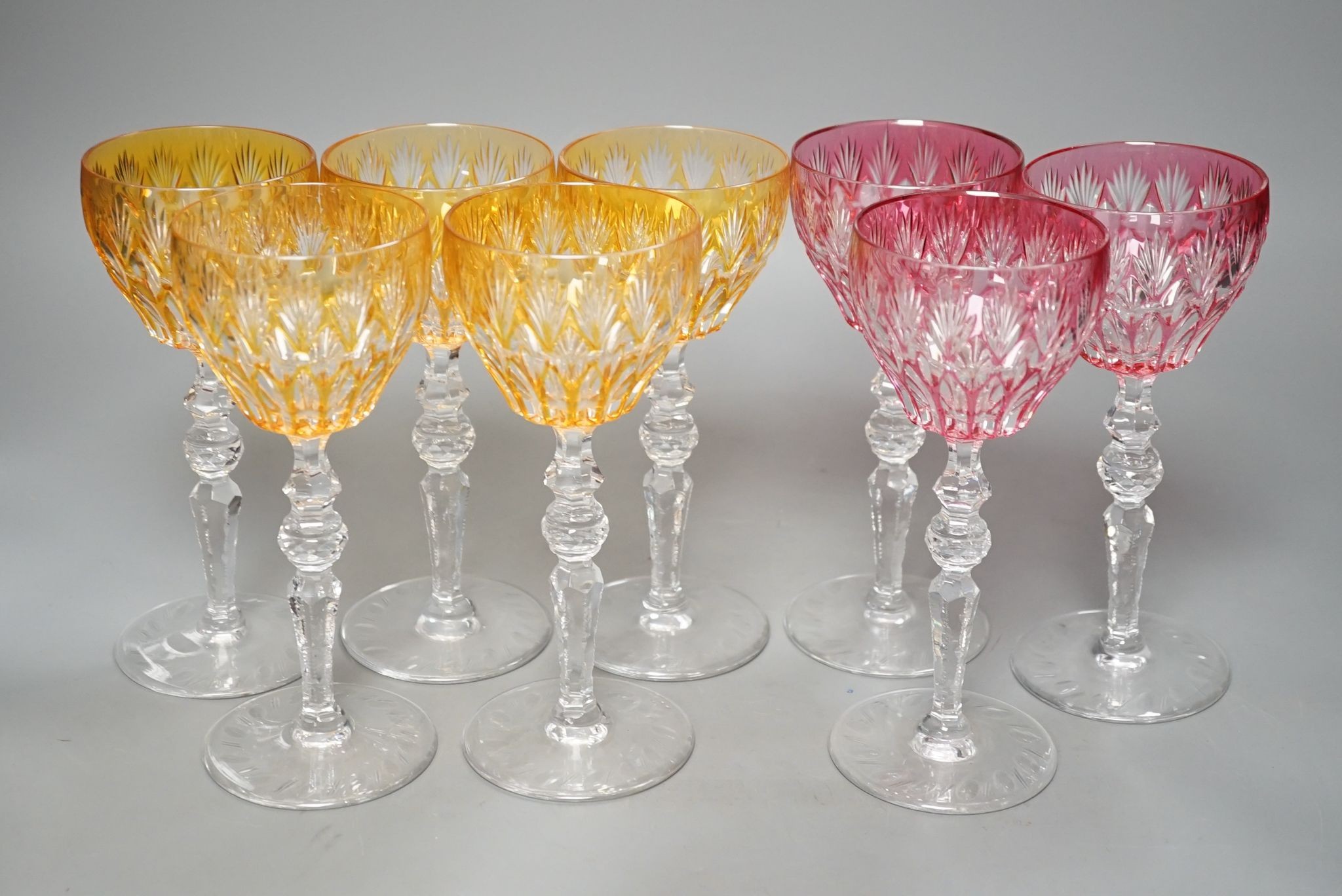 Eight hock or claret wine glasses, with colour flashed bowls, 20cm